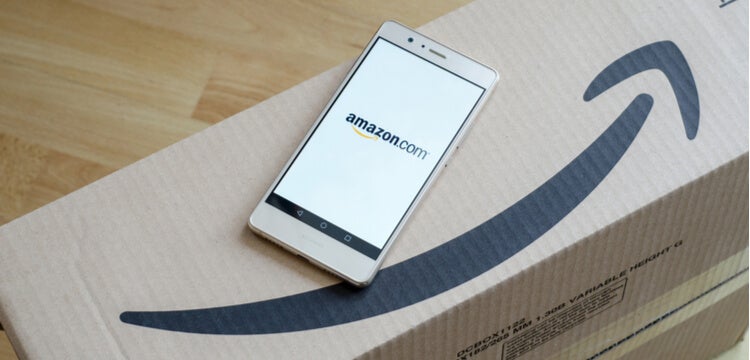 Amazon Request Review: Amazon box and cell phone